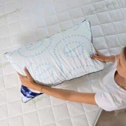 Super Sleeper Pro Adjustable Every Comfort Pillow With Cooling Technology - TV Double Offer! - Super Sleeper Pro -Home Living Store ECP birds eye view of woman holding white and blue pillow on mattress
