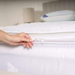 Super Sleeper Pro Mattress Topper - Make Your Mattress Feel Brand New + FREE Pillows - Super Sleeper Pro -Home Living Store Original Topper 2 womans fingers holding zip