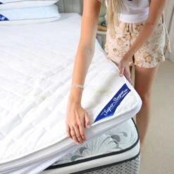 Super Sleeper Pro Mattress Topper - Make Your Mattress Feel Brand New + FREE Pillows - Super Sleeper Pro -Home Living Store Original Topper woman holding mattress topper over mattress