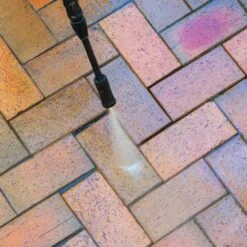 KRAPOF® Compact Electric Pressure Washer + Car Cleaning 6pc Kit + FREE E-Book - Kleva Range -Home Living Store Pressure Washer close up of high pressure spray gun cleaning dirty brick surface 0463f9af 658d 4193 a1dc 27d0755077be