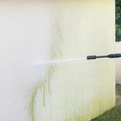 KRAPOF® Compact Electric Pressure Washer + Car Cleaning 6pc Kit + FREE E-Book - Kleva Range -Home Living Store Pressure Washer close up of high pressure spray gun cleaning dirty white wall f8a20f6a 9816 448c 8c5a 024be63e0b0b